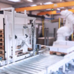 Pallet stacker and destacker for palletising cells