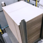 Layer pad magazine for palletising