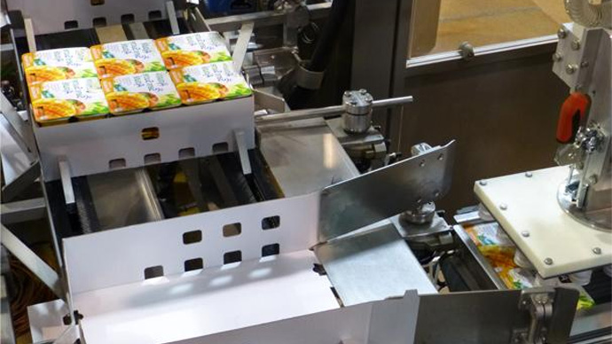 Wrap-Around Case Packer for Dessert Pots