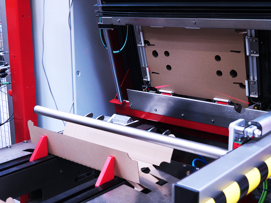 Multi format wrap around case packer case formation