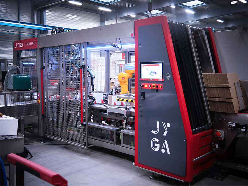 Multi format wrap around case packer global view