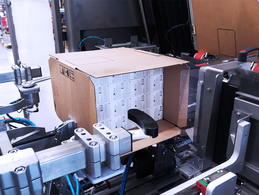 Side load case packer cartons