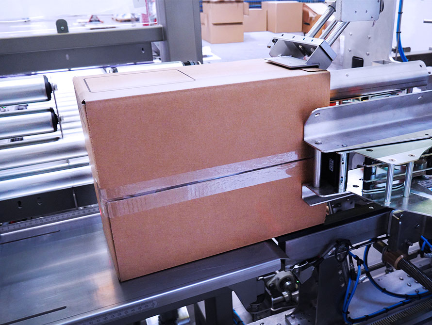 Side load case packer case exit