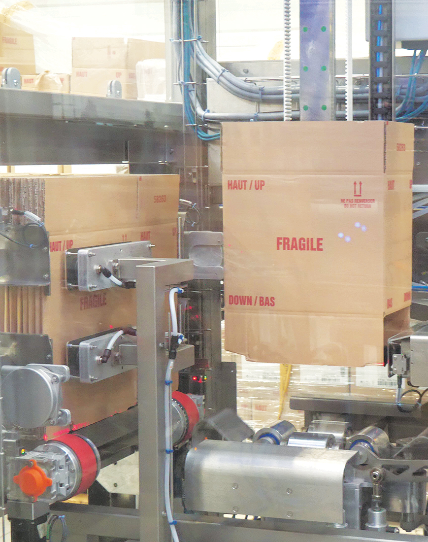 Multi-format top-load case packer – case forming
